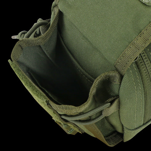 Close-up of an empty Condor Gadget Pouch - MultiCam, crafted from durable fabric with visible stitching and straps, perfect for law enforcement or shooting range use.