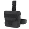 The Condor Drop Leg Dump Pouch is a black tactical pouch with a flap closure, adjustable straps, and MOLLE webbing—perfect for EDC or bushcraft and designed for secure attachment to gear or belts.