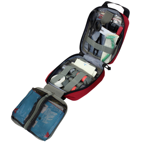 The Condor Rip-Away EMT Pouch displays organized medical supplies—bandages, tape, gauze, scissors, and antiseptic wipes—neatly stored in mesh and elastic compartments.