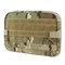 The Condor T & T Pouch in MultiCam features a rectangular design with a camouflage pattern and horizontal webbing straps on the front.