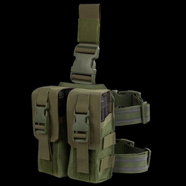 The Condor Drop Leg M4 Mag Pouch in Olive Drab features two compartments, adjustable straps, and plastic buckles, designed for carrying equipment or magazines.