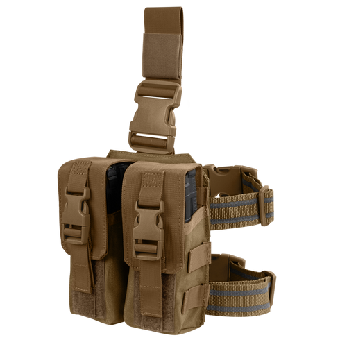 The Condor Drop Leg M4 Mag Pouch in coyote brown features two compartments, buckles, and adjustable straps—perfect for carrying gear or magazines.