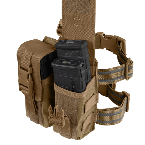 The Condor Drop Leg M4 Mag Pouch is a tan tactical pouch with adjustable straps and buckle closures, designed to securely hold two black rifle magazines.