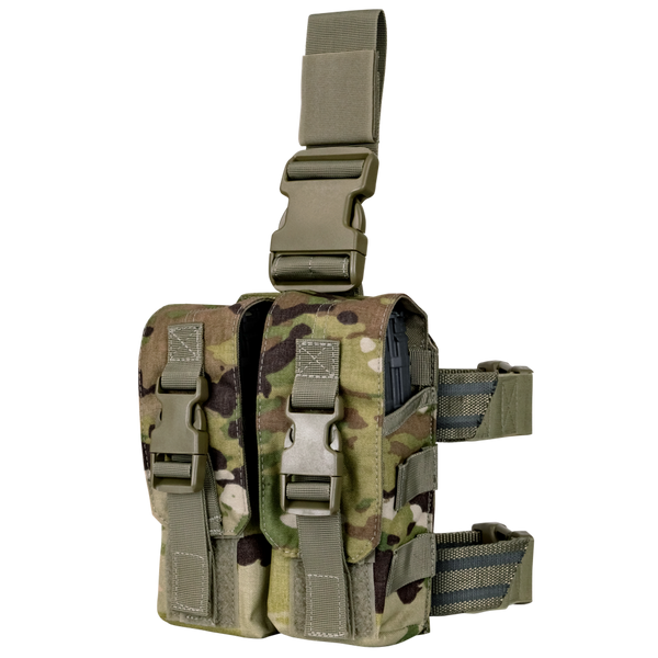 The Condor Drop Leg M4 Mag Pouch in Scorpion OCP features a camouflage pattern, two front pouches, adjustable straps, and quick-release buckles.