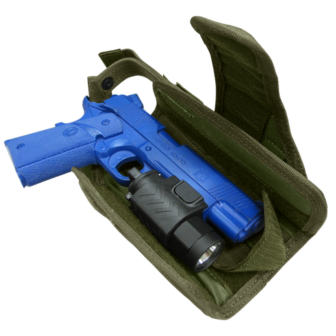 A blue training pistol with a flashlight is secured in a Condor HT Holster, shown open in green.