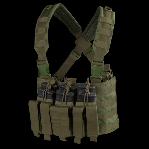 The Condor Recon Chest Rig in Olive Drab features multiple pouches and straps, equipped with six black rifle magazines inserted in the front pockets.