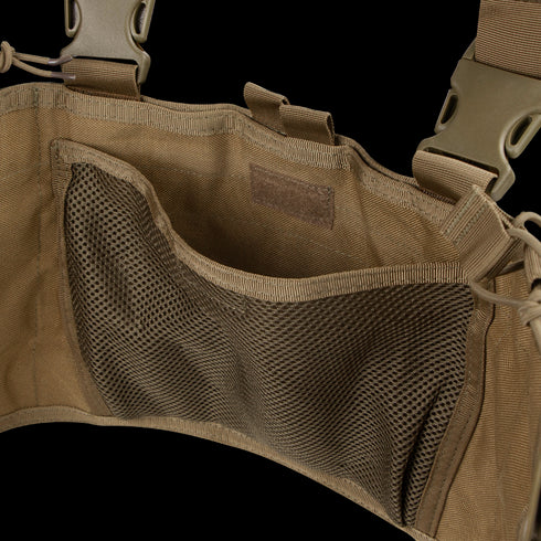 Close-up of an empty Condor Recon Chest Rig in tan, featuring a mesh pocket and adjustable straps.