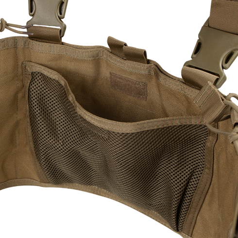Close-up of an empty Condor Recon Chest Rig in tan, featuring a mesh pocket and adjustable straps.