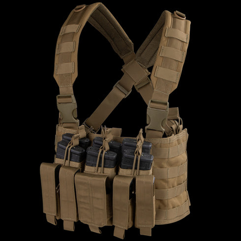 The Condor Recon Chest Rig is a tan tactical chest rig with multiple pouches for magazines and gear, adjustable shoulder straps, and MOLLE webbing.