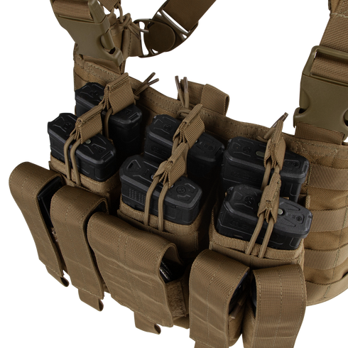 The Condor Recon Chest Rig in tan features multiple pouches with elastic cords, securely holding several black rifle magazines.