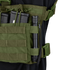 A close-up of the Condor Rapid Assault Chest Rig shows two rifle magazines and a black flashlight secured in green pouches, with visible straps and buckles.