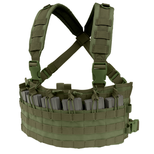 The Condor Rapid Assault Chest Rig in Olive Drab features adjustable shoulder straps, multiple magazine pouches, and MOLLE webbing, shown holding several gray rifle magazines.