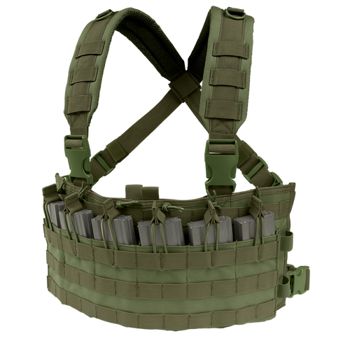 The Condor Rapid Assault Chest Rig in Olive Drab features adjustable shoulder straps, multiple magazine pouches, and MOLLE webbing, shown holding several gray rifle magazines.