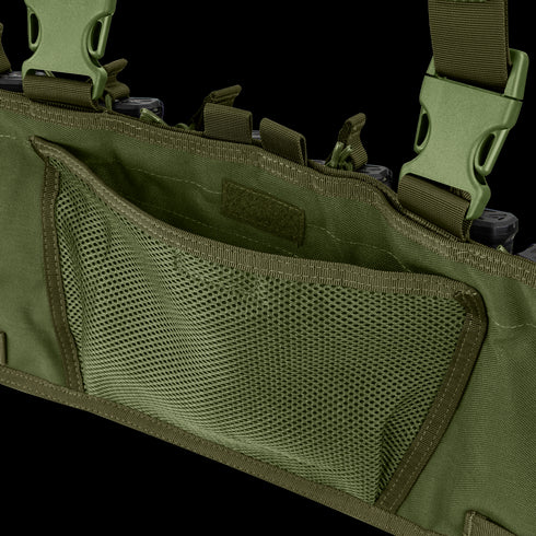 Close-up of the Condor Rapid Assault Chest Rig in olive green, featuring mesh interior pockets and clip fastenings.