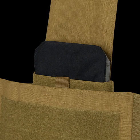 A close-up of a Condor Modular Operator Plate Carrier Gen II in MultiCam Black with a black ballistic plate partially inserted into its pocket, popular among law enforcement.