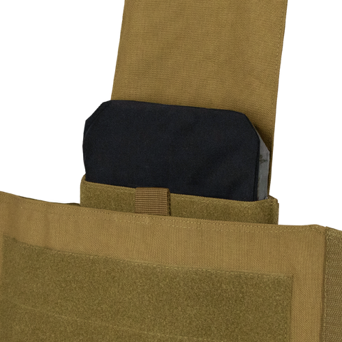 A ballistic plate partially inserted into the Condor Modular Operator Plate Carrier Gen II in Scorpion OCP, a tactical vest widely used by military and law enforcement personnel.