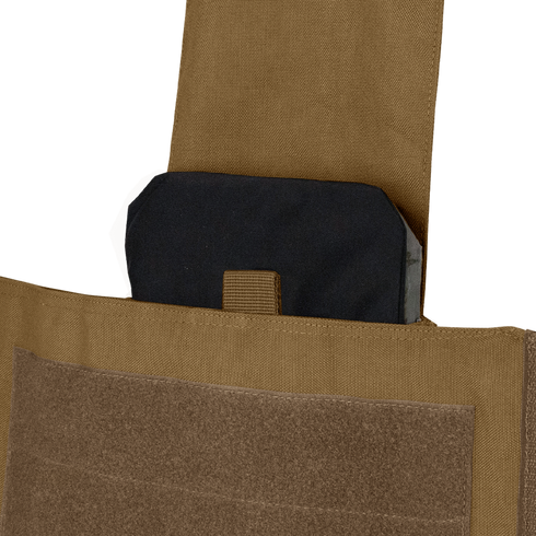 A Condor VAS Side Plate Insert (Pair) in black is shown partially inserted into a brown tactical vest pocket with a hook-and-loop fastener.