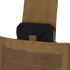 A black protective plate is partially inserted into the upper pocket of a tan Condor Modular Operator Plate Carrier Gen II.
