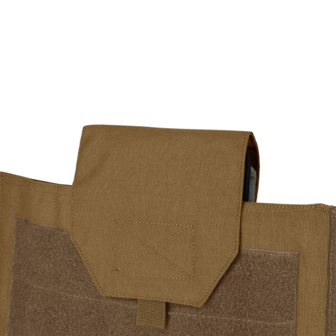 Close-up of a tan Condor Modular Operator Plate Carrier Gen II, showing its tactical pouch with flap closure attached to the velcro panel, set against a matching fabric background.