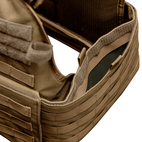 Close-up of the Condor Modular Operator Plate Carrier Gen II in tan, featuring MOLLE webbing and an open compartment displaying the inner padding or plate insert.
