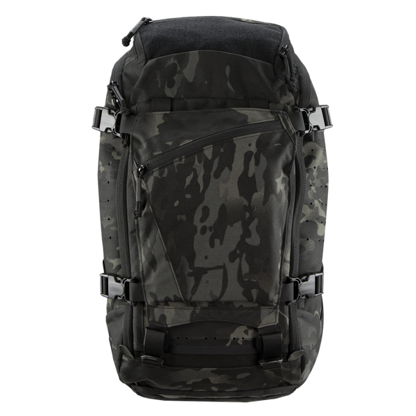The Condor Nomad Backpack 25L in MultiCam Black features multiple zippers, adjustable straps, and a top handle, shown from the front.
