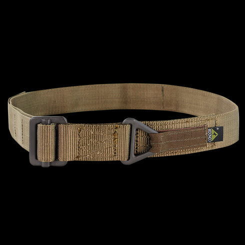The Condor Riggers Belt is a tan tactical nylon belt featuring a black metal buckle and a small rectangular black and yellow tag on the side.