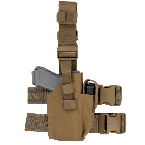 The Condor Tactical Leg Holster features adjustable straps and securely holds a grey training pistol and black flashlight, making it ideal for shooting range practice or military use.