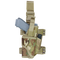 The Condor Tornado Tactical Leg Holster - MultiCam securely holds a gray training pistol and a magazine, featuring adjustable straps and plastic buckles for a customizable fit.