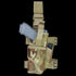 The Condor Tornado Tactical Leg Holster - MultiCam securely holds a gray training pistol and a magazine, featuring adjustable straps and plastic buckles for a customizable fit.