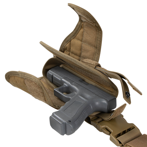 A Condor Tornado Tactical Leg Holster - Left Hand in tan, shown with its flap open and strap retention system securing a partially inserted black handgun.