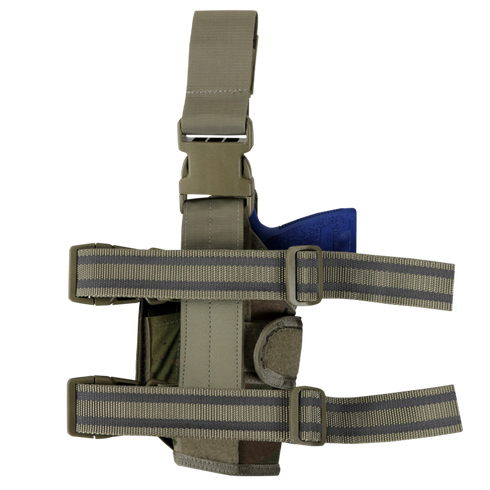The Condor Tornado Tactical Leg Holster - MultiCam features adjustable straps and buckles, securely holding your sidearm on the leg for tactical use.