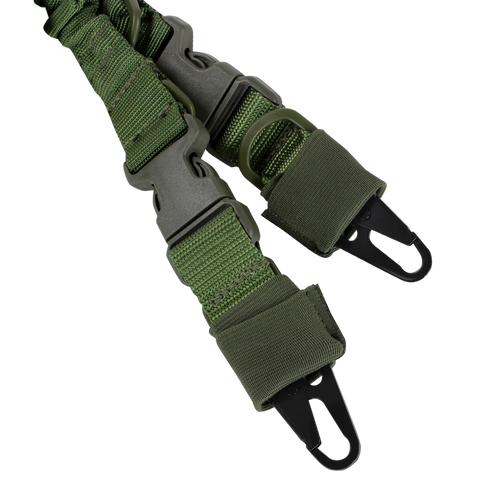 Close-up of two green adjustable straps with plastic buckles and metal clips, components of the Condor CBT 2-Point Bungee Sling - MultiCam.