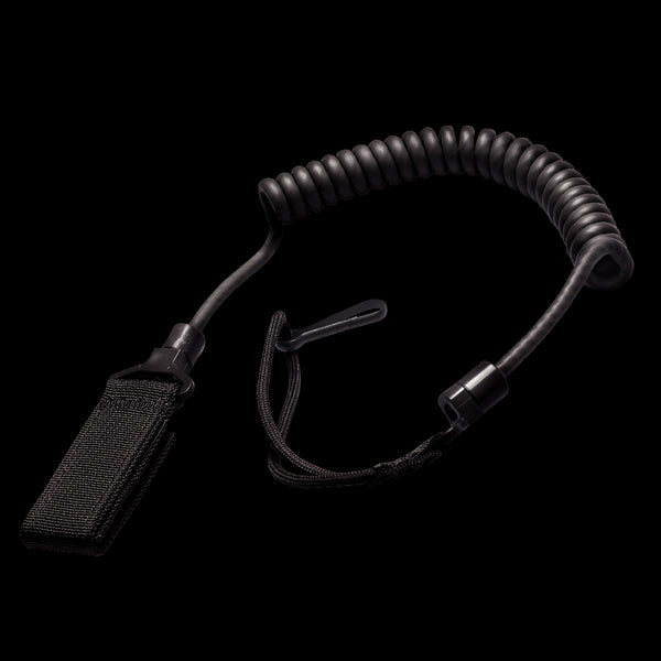 The Condor Pistol Lanyard is a coiled black lanyard with a wrist strap and Velcro attachment, designed to secure small items or tools.