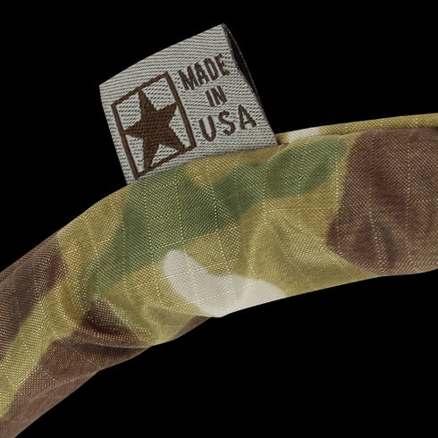 A close-up of the Condor Tube Cover - MultiCam, featuring camouflage-patterned fabric and a tag with MADE IN USA and a star emblem.
