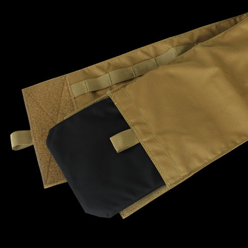 A close-up of the Condor Cyclone Plate Carrier in MultiCam shows a tan fabric sleeve with a hook-and-loop closure, partially revealing a black rectangular plate—perfect for military or first responder use.