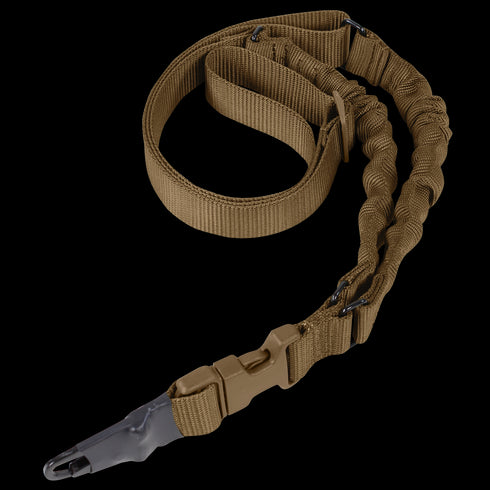 The Condor Adder Double Bungee 1-Point Sling is a tan tactical rifle sling featuring bungee sections, a metal clip, and a plastic quick-release buckle, shown coiled in an S-shape.