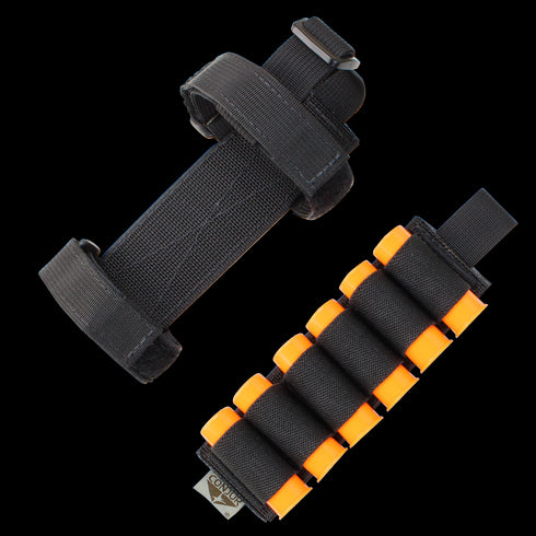 The Condor TSRS Buttstock Shell Platform includes two black nylon straps with hook-and-loop fasteners: one plain, and one featuring elastic loops that hold eight orange foam darts.