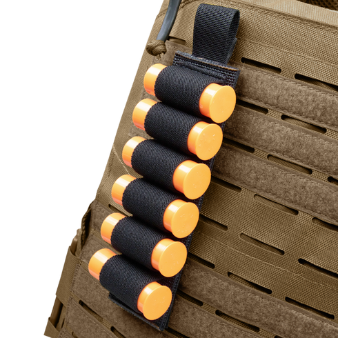 The Condor TSRS Shotshell Strip is a black elastic holder attached to a tactical vest, holding six orange shotgun shells.