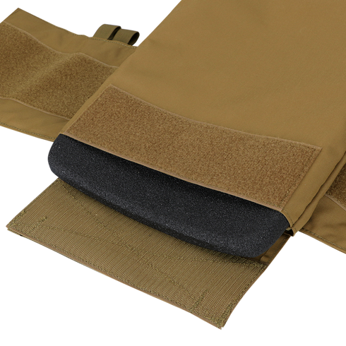 Close-up of the Condor Cyclone RS Plate Carrier in MultiCam Black, showing a black protective plate partially inserted into its Velcro-secured pouch.