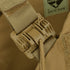 Close-up of a tan plastic buckle attached to nylon straps on the Condor Cyclone RS Plate Carrier in MultiCam Black, tactical gear favored by military and law enforcement.