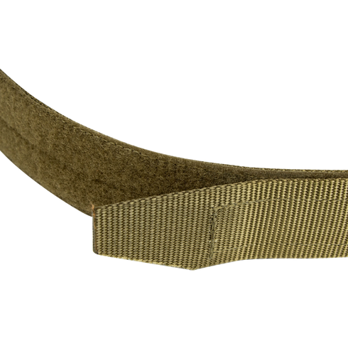 Close-up of the Condor Hybrid EDC Belt in tan or olive green with a hook-and-loop fastener, designed for tactical, military, or law enforcement use, displayed against a matching vertically striped background.