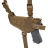 The Condor Universal Shoulder Holster in tan features adjustable straps, secure snap closures, and holds a black pistol securely.