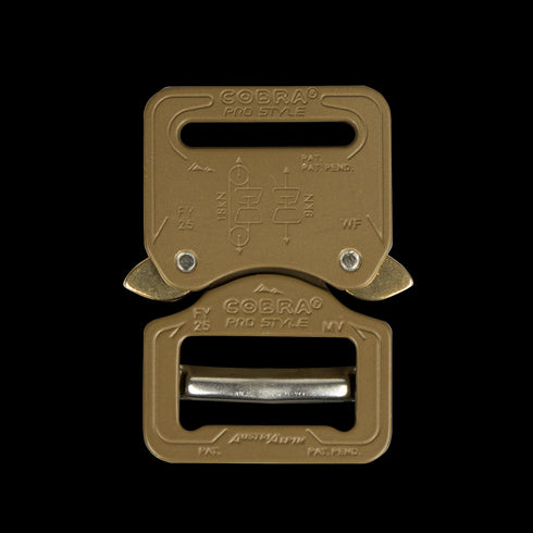 The Austrialpin Cobra Buckle – Pro Style features a tan metal finish with engraved text, directional arrows, and locking clasps, making it ideal for EDC or bushcraft. Shown here on a white background.