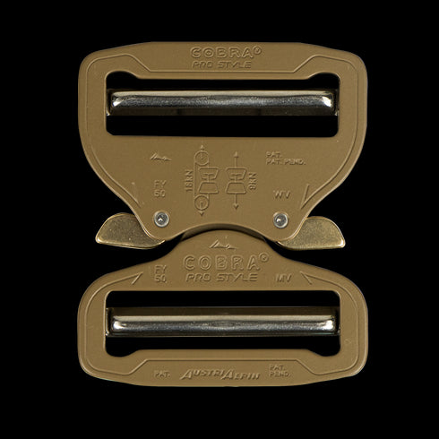 The Austrialpin Cobra Buckle - Pro Style in tan features quick-release metal locking bars, engraved instructions, and branded surface—ideal for Law Enforcement, Military use, or the shooting range.