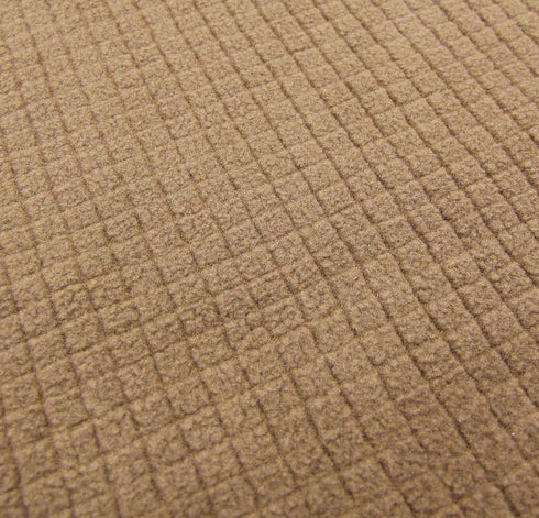 Close-up of Condor’s Base II Mid-Weight Drawer in Sand Storm, showing its brown textured fabric with a grid pattern and soft, raised surface—ideal for tactical gear used by military and law enforcement.