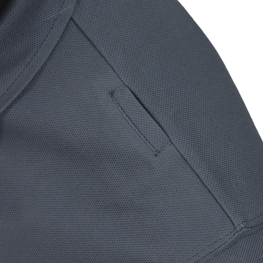 Close-up of the Condor Short Sleeve Performance Tactical Polo in dark gray, featuring a small rectangular welt pocket and visible stitching—designed for durability, ideal for First Responder or Military uniforms.