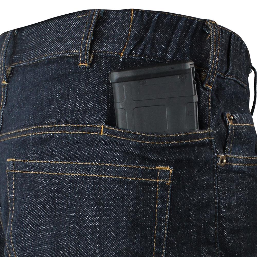 A tactical black magazine is partially visible inside the back pocket of Condor Cipher Jeans.