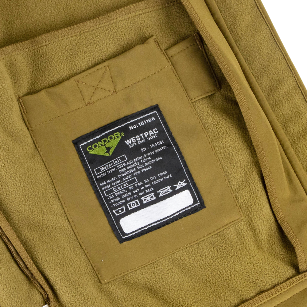 Close-up of a brown Condor Westpac Softshell Jacket, favored in military and tactical circles, featuring an interior label with care instructions and the Condor brand.