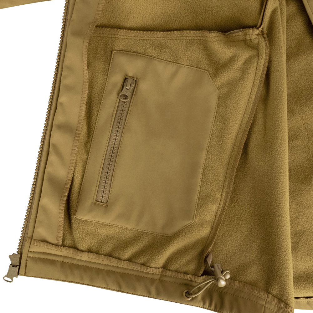 Close-up of the Condor Westpac Softshell Jacket in tan, featuring a zippered interior pocket and adjustable drawstring hem, designed for first responders.