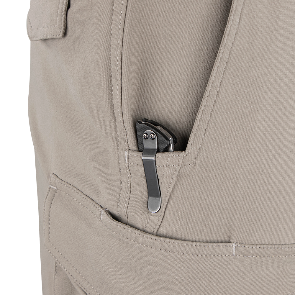A tactical folding pocket knife with a metal clip is partially visible in the front pocket of Condor Patrol ADF Pants.